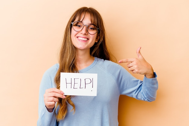 woman holding a help placard isolated on orange