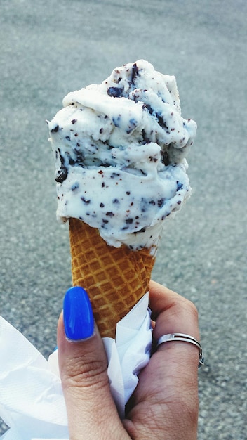 Woman holding ice cream cone