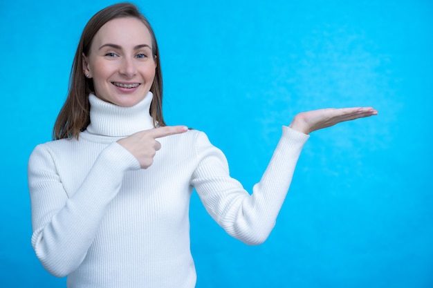 Woman holding imaginary object on the palm