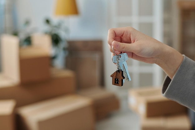 Woman holding keys from new house