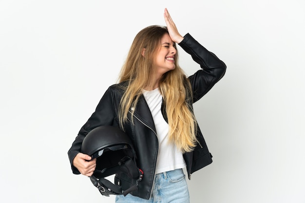 Woman holding a motorcycle helmet isolated on white space has realized something and intending the solution