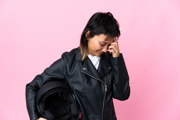 Woman holding a motorcycle helmet