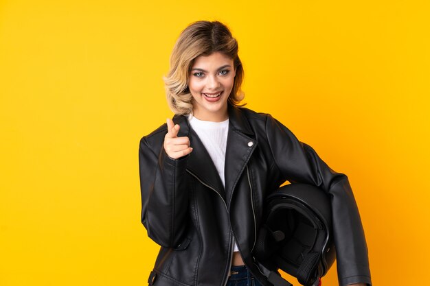 Woman holding a motorcycle helmet