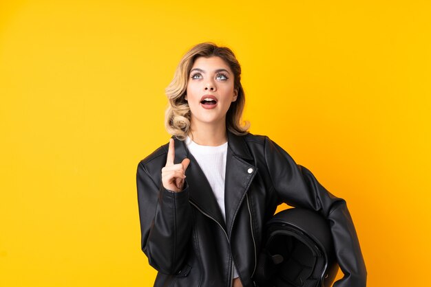 Woman holding a motorcycle helmet