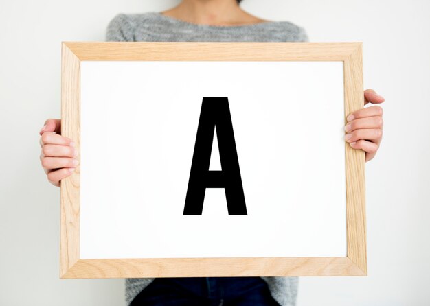 Woman holding paper board