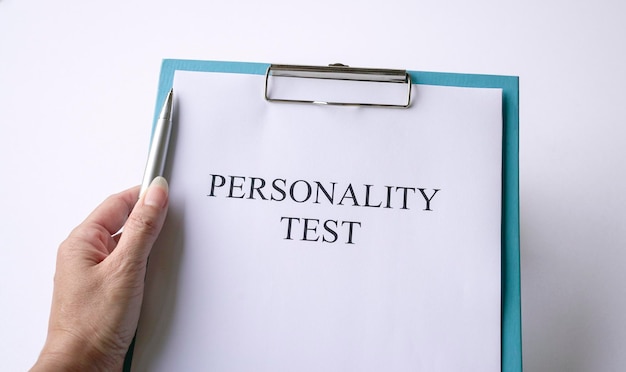 Woman holding a pen with personality test