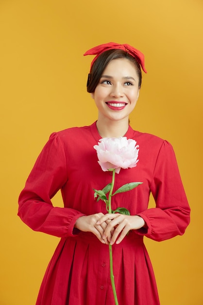 Woman holding peony bouquet