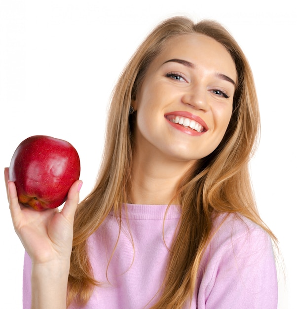 Woman holding red apple