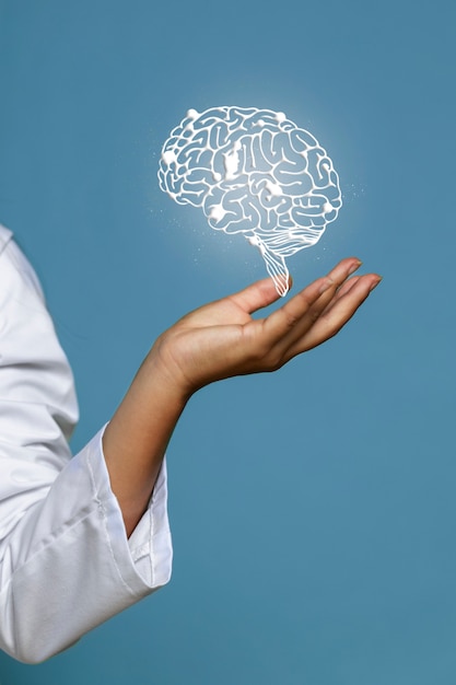 Woman holding shiny brain hologram