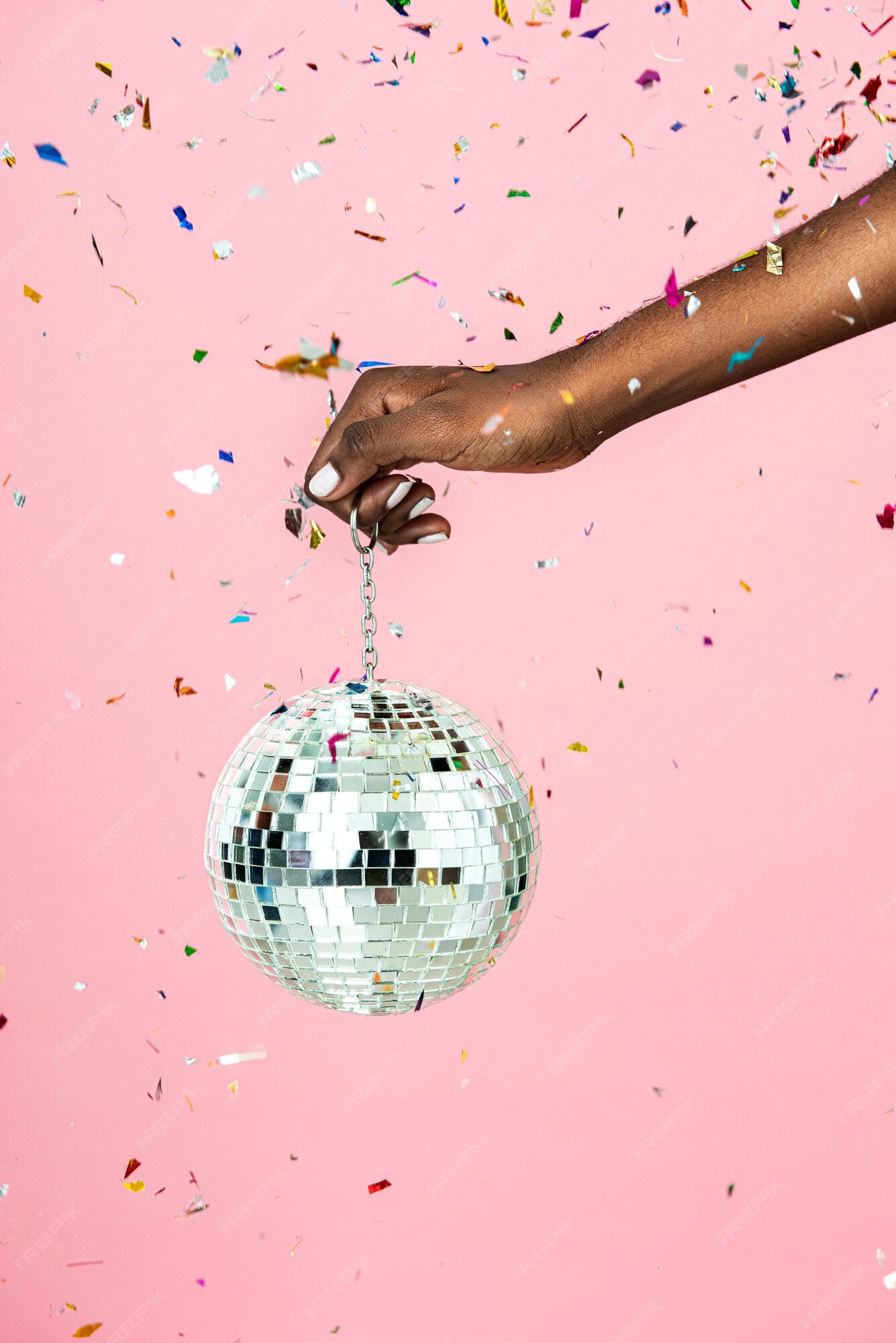 Premium Photo | Woman holding a shiny silver disco ball and confetti Premium Photo | Woman holding a shiny silver disco ball and confetti