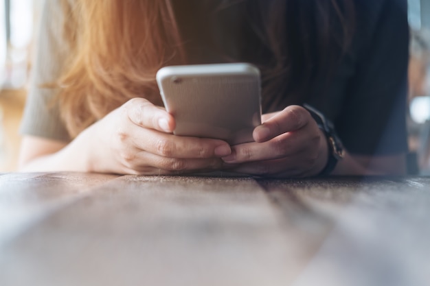 Woman holding smart phone