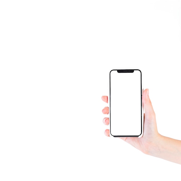 Photo woman holding smartphone with blank white screen