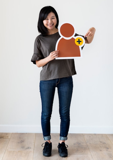 Woman holding a social network icon