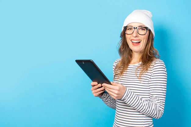 Woman holding a tablet in her hands