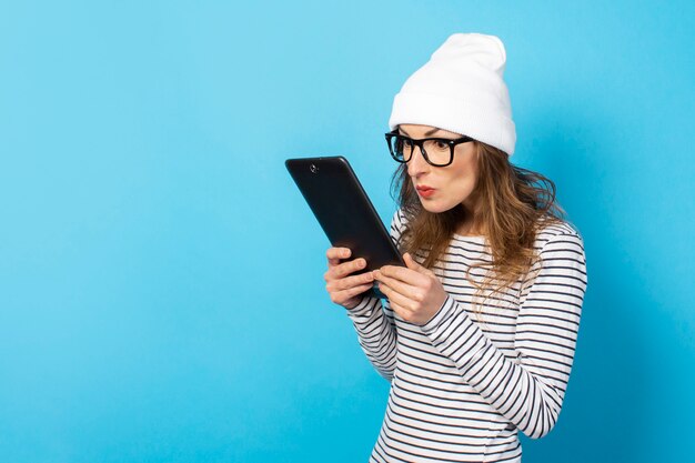 Woman holding a tablet in her hands