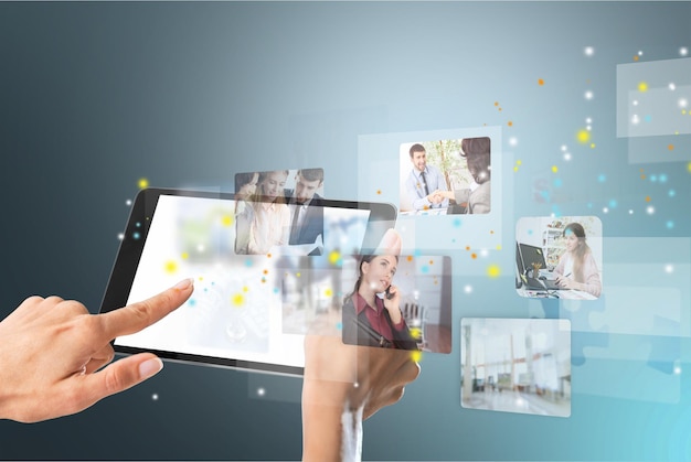 Woman holding the tablet with social media icons