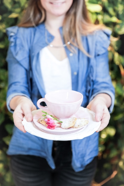 Woman holding a tea cup