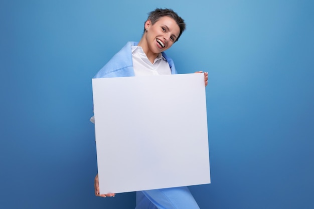 Woman holding a template to insert information