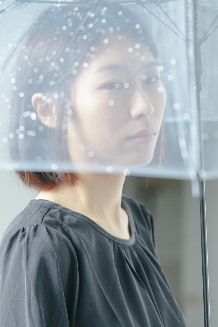 Photo 傘を持った女性