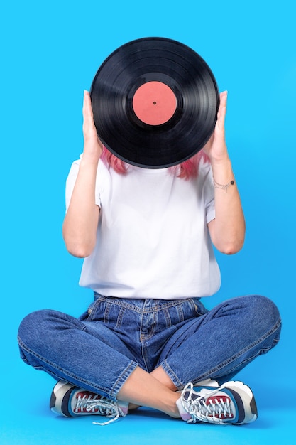 Woman holding vinyl record