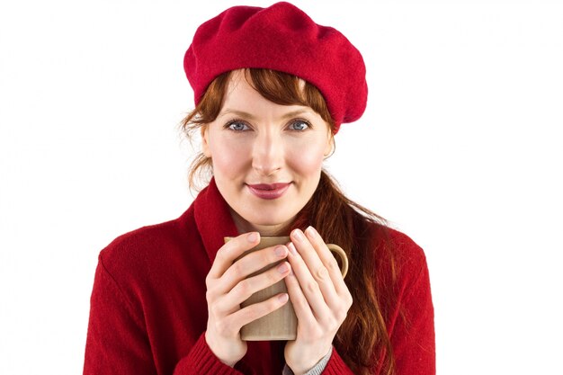 Woman holding a warm cup