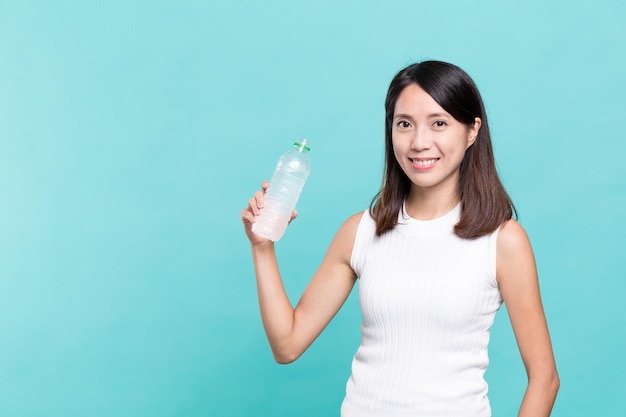 Woman holding water bottle