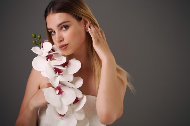 Woman holds beauty flower