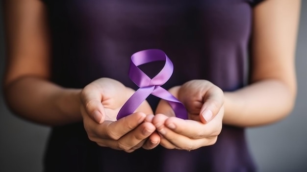 a woman holds a purple ribbon that is tied to her hands.