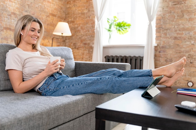 Photo woman at home having videocall with family