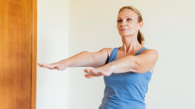 Woman at home training during quarantine