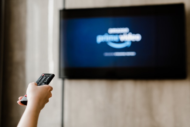 Woman at home watching tv