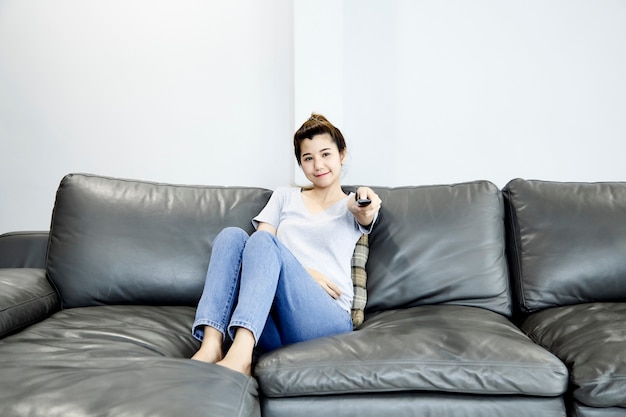 Woman at home watching tv