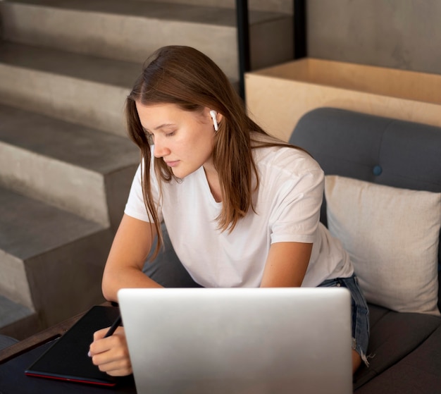 Woman at home working during the pandemic