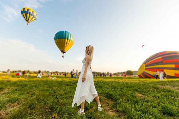 woman and a hot air balloon, summer