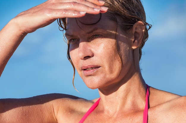 Woman in a hot sunny day