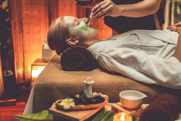 Photo woman indulges in rejuvenating with luxurious face cream spa massage quiescent