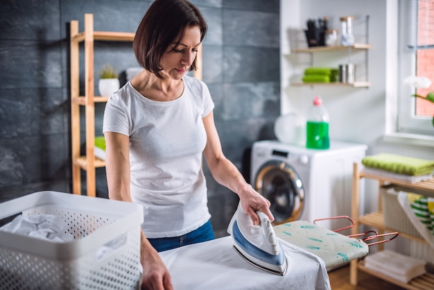 Woman ironing clothes