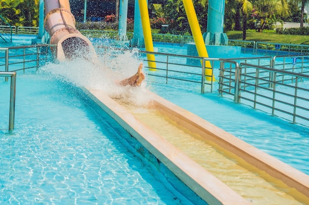 Woman is having fun in the water park