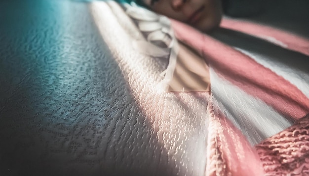 a woman is laying down with a blanket that says  the word  on it