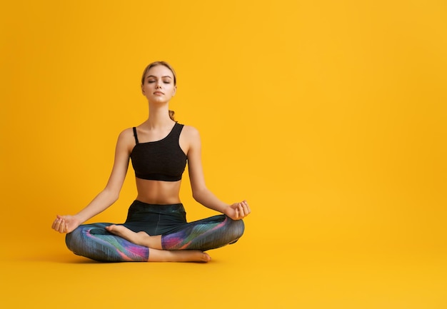 Woman is practicing yoga and meditation