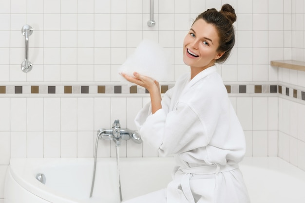 Woman is preparing to take a bath