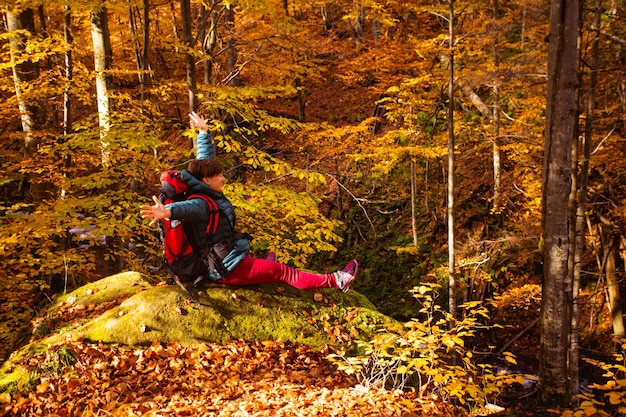 The woman is restoring mental health while hiking