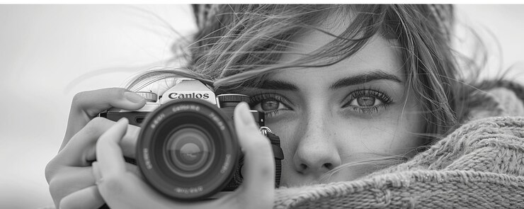 a woman is taking a photo with a camera