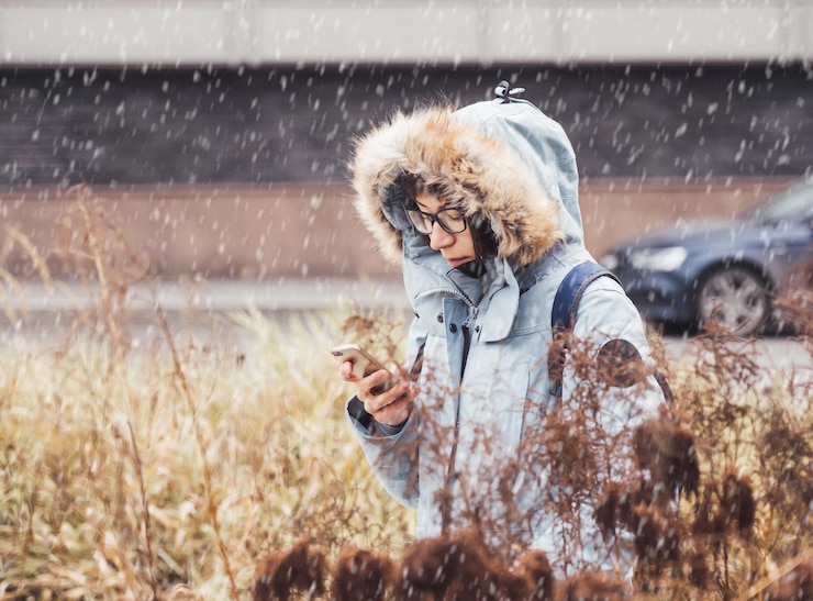 Photo woman is texting someone on smartphone online communication wireless cellular technology