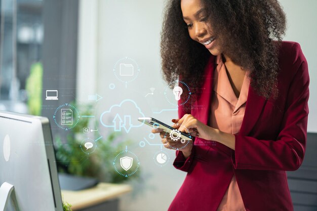 woman is using a smartphone and tablet to access the cloud computing system storage and data transfer cloud network cloud technology