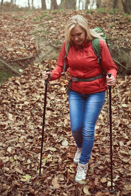 Woman is very watchful while hiking