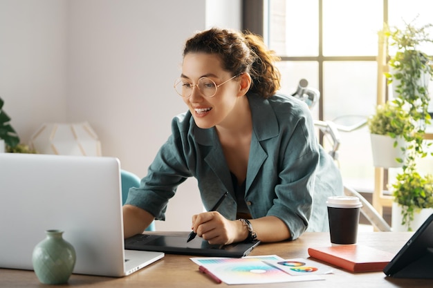 Woman is working at workshop