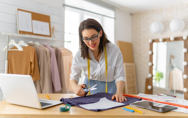 Woman is working at workshop