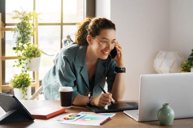 Woman is working at workshop