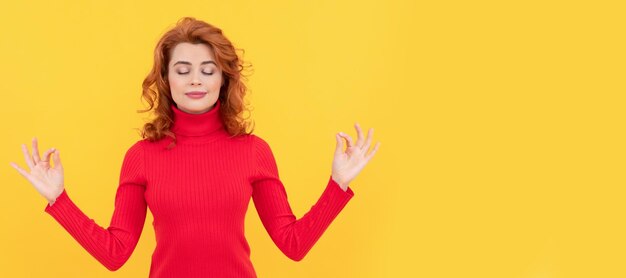 Woman isolated face portrait banner with copy space young redhead woman relax meditating with closed eyes yoga meditation